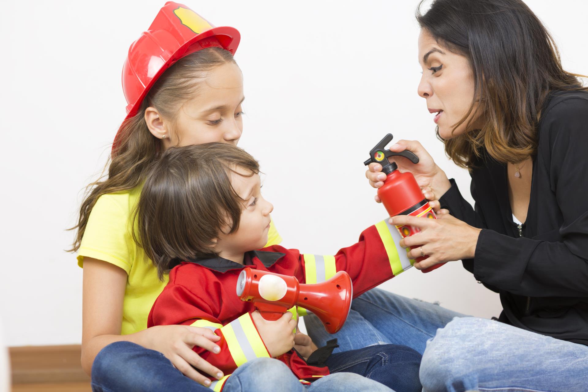 Adult Teaching Fire Safety To Youth