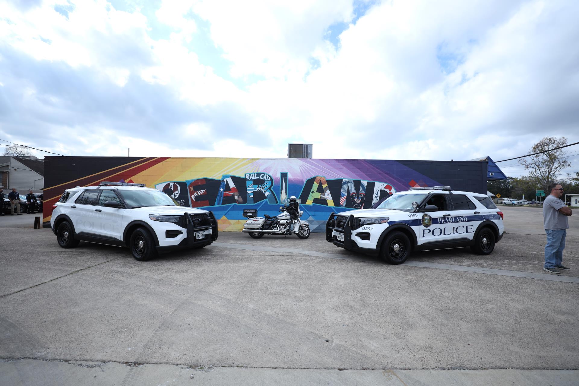 cruisers in front of pearland mural