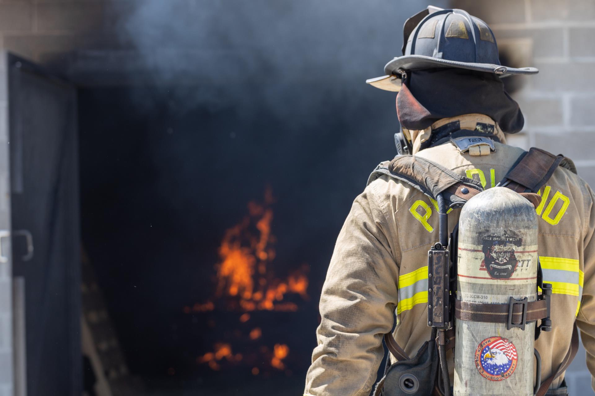 firefighter looking at fire